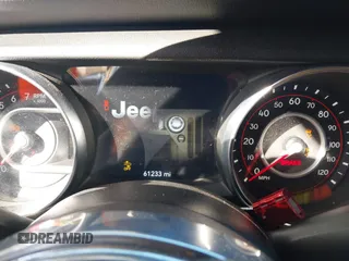 2020 Jeep Gladiator Rubicon z VIN 1C6JJTBG0LL117908, wystawiony jako IAAI lot #41621920 z przebiegiem 61 233 mil mil oraz . Historia ofert i sprzedaży dostępna na DreamBid. Obrazek 7.