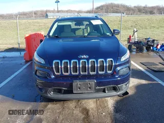 2015 Jeep Cherokee Latitude with VIN 1C4PJMCS0FW583658, listed as a IAAI auction lot 41106819 with 101,849 mi miles. Bid and sale history available at carsss.com. Image 12.