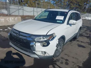 2016 Mitsubishi Outlander SE with VIN JA4AZ3A34GZ035189, listed as a IAAI auction lot 41531995 with 227,574 mi miles and . Bid and sale history available at DreamBid. Image 2.