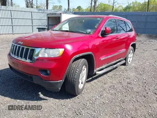 2011 Jeep Grand Cherokee Laredo with VIN 1J4RR4GG5BC512095, listed as a IAAI auction lot 42156490 with 160,749 mi miles. Bid and sale history available at carsss.com. Image 2.