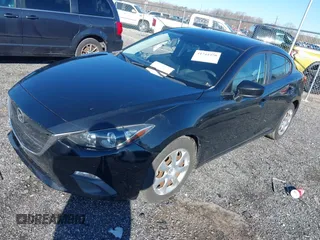 2015 Mazda 3 i Sport with VIN 3MZBM1U72FM210435, listed as a IAAI auction lot 41744470 with 148,624 mi miles. Bid and sale history available at carsss.com. Image 2.