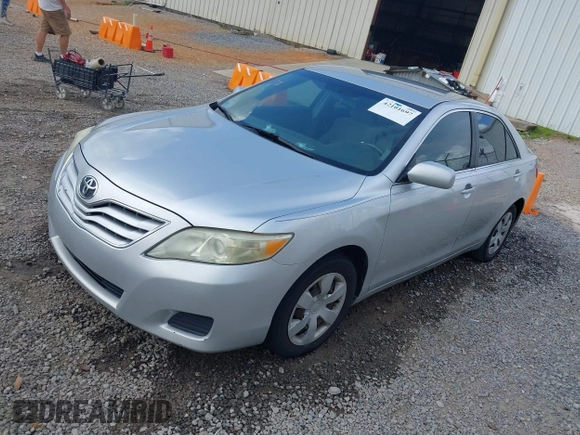 2010 Toyota Camry with VIN 4T1BF3EKXAU014173, listed as a IAAI auction lot 42101697 with 218,976 mi miles and . Bid and sale history available at DreamBid. Image 2.