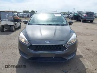 2018 Ford Focus SE z VIN 1FADP3F20JL327186, wystawiony jako IAAI lot #42271070 z przebiegiem 131 511 mil mil oraz . Historia ofert i sprzedaży dostępna na DreamBid. Obrazek 12.