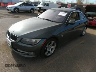 2011 BMW 3 Series 335i xDrive with VIN WBAKF9C56BE619143, listed as a IAAI auction lot 41765227 with 159,620 mi miles. Bid and sale history available at carsss.com. Image 2.
