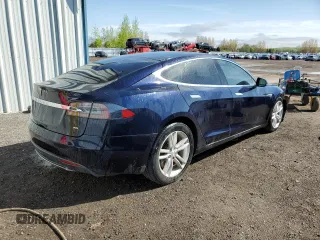 2014 Tesla Model S 60 z VIN 5YJSA1H10EFP35319, wystawiony jako Copart lot #53868745 z przebiegiem 209 424 mil mil oraz Szkoda całkowita • Salvage title. Historia ofert i sprzedaży dostępna na DreamBid. Obrazek 3.