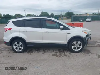 2014 Ford Escape SE with VIN 1FMCU9GX2EUA62133, listed as a IAAI auction lot 42342688 with Not provided miles and . Bid and sale history available at DreamBid. Image 14.