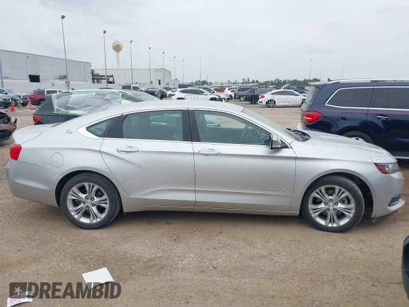 2014 Chevrolet Impala LT with VIN 2G1125S33E9101056, listed as a IAAI auction lot 41877161 with 130,757 mi miles and . Bid and sale history available at DreamBid. Image 14.