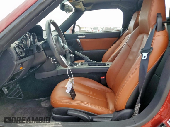 2008 Mazda MX-5 Miata Grand Touring z VIN JM1NC26F180144365, wystawiony jako Copart lot #58216365 z przebiegiem 56 990 mil mil oraz Szkoda całkowita • Salvage title. Historia ofert i sprzedaży dostępna na DreamBid. Obrazek 7.