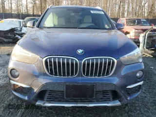 2018 BMW X1 xDrive28i with VIN WBXHT3C32J3H31391, listed as a Copart auction lot 88584855 with 32,441 mi miles and Salvage Title. Bid and sale history available at DreamBid. Image 5.