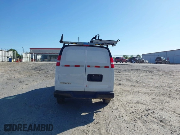 2021 Chevrolet Express Cargo with VIN 1GCWGAFP0M1262410, listed as a IAAI auction lot 42007712 with 61,620 mi miles and . Bid and sale history available at DreamBid. Image 16.