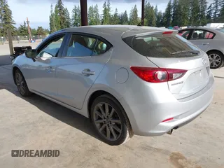 2018 Mazda 3 Touring z VIN 3MZBN1L37JM201797, wystawiony jako IAAI lot #42258756 z przebiegiem 80 593 mil mil oraz . Historia ofert i sprzedaży dostępna na DreamBid. Obrazek 3.