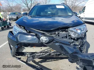 2018 Toyota RAV4 SE with VIN 2T3JFREVXJW817341, listed as a IAAI auction lot 41599972 with 99,739 mi miles. Bid and sale history available at carsss.com. Image 12.