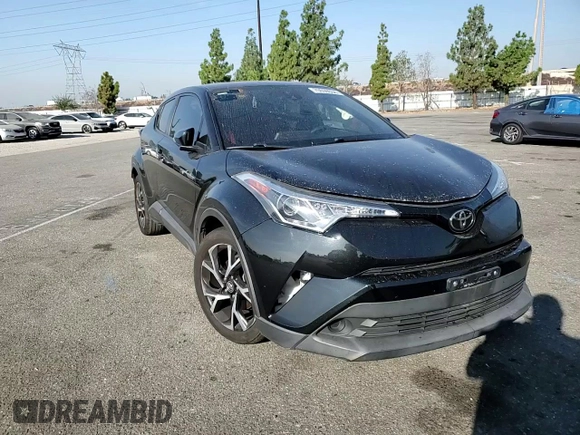 2018 Toyota C-HR XLE with VIN NMTKHMBX7JR022593, listed as a Copart auction lot 70659634 with 106,692 mi miles and Salvage Title. Bid and sale history available at carsss.com. Image 10.