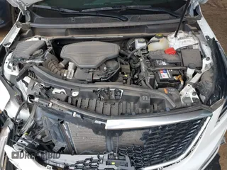 2021 Cadillac XT5 FWD Premium Luxury with VIN 1GYKNCRS5MZ224957, listed as a IAAI auction lot 41794648 with 28,540 mi miles and . Bid and sale history available at carsss.com. Image 10.