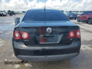 2010 Volkswagen Jetta S with VIN 3VWJZ7AJ3AM029692, listed as a Copart auction lot 61743435 with Not provided miles and Salvage title. Bid and sale history available at DreamBid. Image 6.