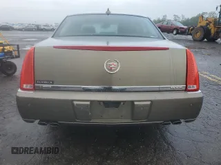 2010 Cadillac DTS 1SD z VIN 1G6KH5EY6AU126664, wystawiony jako Copart lot #58533225 z przebiegiem Nie podano mil oraz Szkoda całkowita • Salvage title. Historia ofert i sprzedaży dostępna na DreamBid. Obrazek 6.