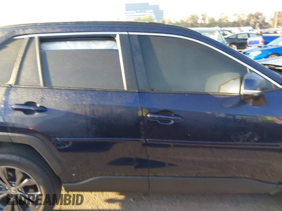 2024 Toyota RAV4 Hybrid XLE Premium with VIN JTMB6RFV0RD141316, listed as a IAAI auction lot 41980384 with 13,270 mi miles and . Bid and sale history available at DreamBid. Image 13.