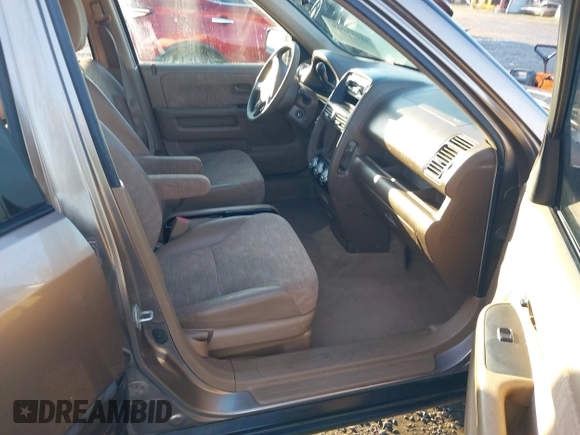 2004 Honda CR-V LX with VIN JHLRD68474C012546, listed as a IAAI auction lot 41288069 with 212,872 mi miles and . Bid and sale history available at DreamBid. Image 5.