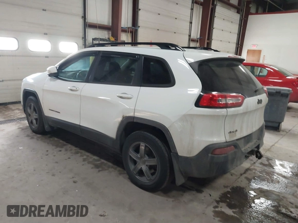 2014 Jeep Cherokee Latitude with VIN 1C4PJMCS5EW288909, listed as a IAAI auction lot 41531117 with 108,971 mi miles and . Bid and sale history available at DreamBid. Image 3.