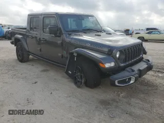 2024 Jeep Gladiator Sport S with VIN 1C6HJTAG8RL128891, listed as a Copart auction lot 44198995 with 1,189 mi miles and Salvage title. Bid and sale history available at DreamBid. Image 4.