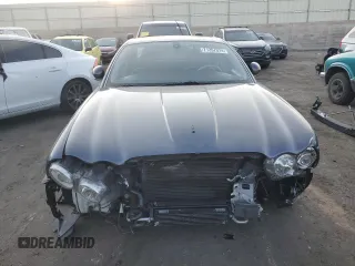 2004 Jaguar XJ with VIN SAJWA73B64TG30921, listed as a Copart auction lot 71267074 with 20,031 mi miles and Salvage Title. Bid and sale history available at carsss.com. Image 5.
