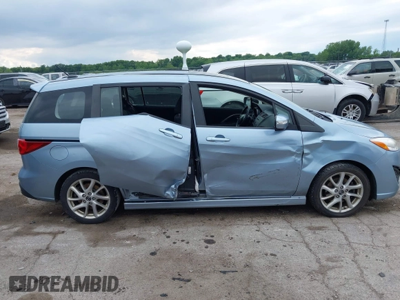 2013 Mazda 5 Touring z VIN JM1CW2CL1D0147902, wystawiony jako IAAI lot #42379728 z przebiegiem Nie podano mil oraz . Historia ofert i sprzedaży dostępna na DreamBid. Obrazek 12.