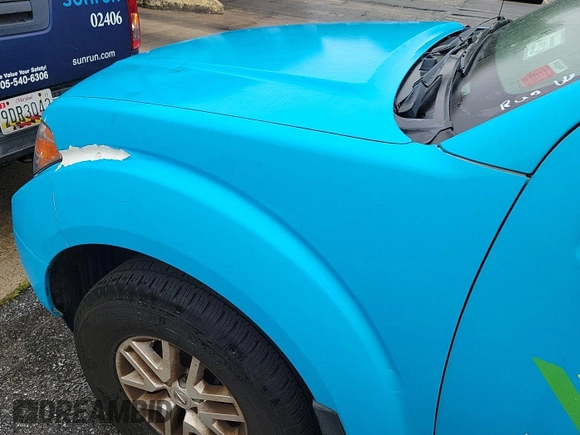 2018 Nissan Frontier SV with VIN 1N6AD0CW9JN760986, listed as a IAAI auction lot 42621224 with 96,456 mi miles and . Bid and sale history available at DreamBid. Image 12.