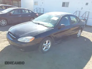 2000 Ford Taurus SE with VIN 1FAFP5321YG249478, listed as a IAAI auction lot 41686339 with 221,015 mi miles and . Bid and sale history available at DreamBid. Image 6.