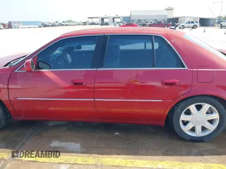 2007 Cadillac DTS Luxury I with VIN 1G6KD57Y57U171192, listed as a IAAI auction lot 41911758 with 138,515 mi miles. Bid and sale history available at carsss.com. Image 14.