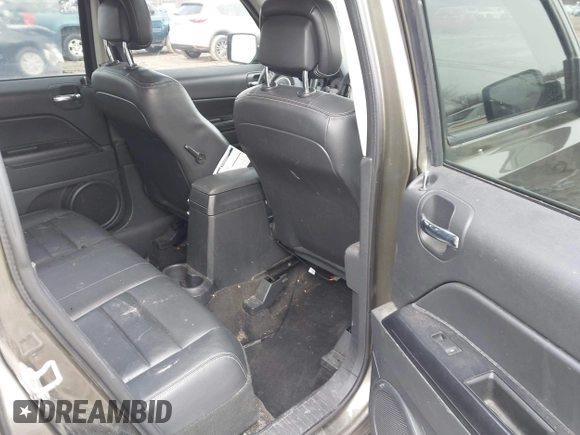 2015 Jeep Patriot High Altitude with VIN 1C4NJPFAXFD342049, listed as a IAAI auction lot 41693119 with 127,259 mi miles and . Bid and sale history available at DreamBid. Image 8.