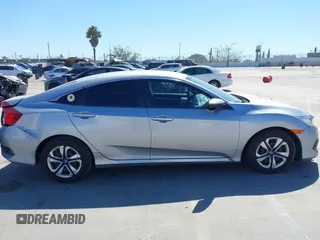 2017 Honda Civic LX z VIN 2HGFC2F5XHH572573, wystawiony jako IAAI lot #41825261 z przebiegiem 83 599 mil mil oraz . Historia ofert i sprzedaży dostępna na DreamBid. Obrazek 13.