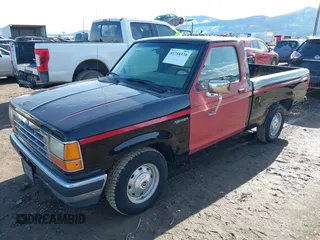 1990 Ford Ranger XLT with VIN 1FTCR10AXLUB92428, listed as a IAAI auction lot 41710370 with 31,036 mi miles. Bid and sale history available at carsss.com. Image 2.