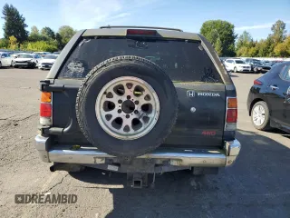 1995 Honda Passport z VIN 4S6CM58V0S4425974, wystawiony jako Copart lot #73371724 z przebiegiem 161 173 mil mil oraz Tytuł czysty. Historia ofert i sprzedaży dostępna na DreamBid. Obrazek 6.