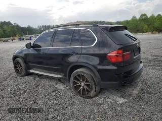 2013 BMW X5 xDrive50i with VIN 5UXZV8C55DL899584, listed as a Copart auction lot 54257745 with 111,367 mi miles and Clean title. Bid and sale history available at DreamBid. Image 2.