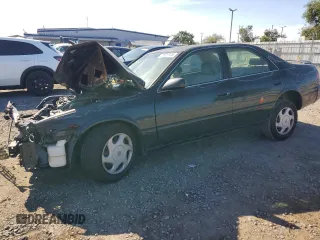1998 Toyota Camry LE z VIN JT2BF22K9W0092647, wystawiony jako Copart lot #51695945 z przebiegiem 260 918 mil mil oraz Szkoda całkowita • Salvage title. Historia ofert i sprzedaży dostępna na DreamBid. Obrazek 1.