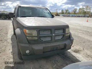 2011 Dodge Nitro SXT z VIN 1D4PT5GK0BW564938, wystawiony jako Copart lot #76313854 z przebiegiem Nie podano mil oraz Czysty tytuł • Clean title. Historia ofert i sprzedaży dostępna na DreamBid. Obrazek 5.