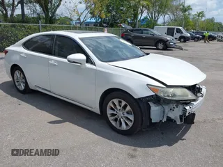 2013 Lexus ES 300h Hybrid with VIN JTHBW1GG0D2002520, listed as a IAAI auction lot 42049567 with 195,538 mi miles. Bid and sale history available at carsss.com. Image 1.