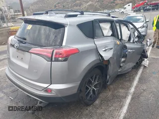 2018 Toyota RAV4 SE with VIN JTMNFREV1JD121028, listed as a IAAI auction lot 42408050 with Not provided miles and . Bid and sale history available at DreamBid. Image 4.