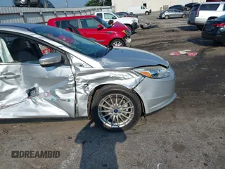 2014 Ford Focus Electric with VIN 1FADP3R43EL353378, listed as a IAAI auction lot 42555423 with 58,114 mi miles and . Bid and sale history available at DreamBid. Image 6.