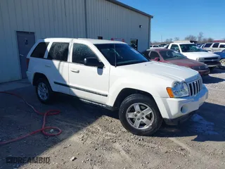 2007 Jeep Grand Cherokee Laredo with VIN 1J8HS48PX7C657685, listed as a IAAI auction lot 41748528 with 247,534 mi miles. Bid and sale history available at carsss.com. Image 1.
