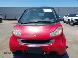 2011 Smart fortwo Passion z VIN WMEEK3BA7BK427739, wystawiony jako IAAI lot #42224225 z przebiegiem 31 675 mil mil oraz . Historia ofert i sprzedaży dostępna na DreamBid. Obrazek 6.
