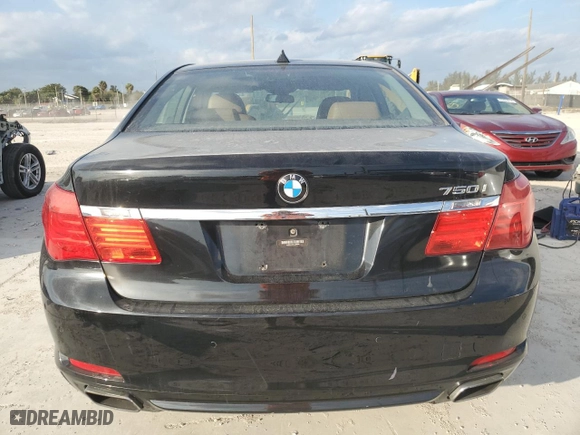 2012 BMW 7 Series 750i xDrive with VIN WBAKC6C58CC396835, listed as a Copart auction lot 86833724 with 0 mi miles and Salvage Title. Bid and sale history available at carsss.com. Image 6.