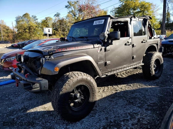 2018 Jeep Wrangler JK Unlimited Rubicon Recon with VIN 1C4HJWFG5JL803636, listed as a Copart auction lot 76370924 with 77,943 mi miles and Salvage Title. Bid and sale history available at carsss.com. Image 1.