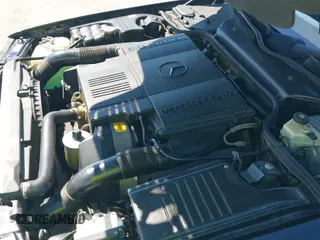 1995 Mercedes-Benz SL 5.0L with VIN WDBFA67E5SF120368, listed as a IAAI auction lot 43164450 with 110,984 mi miles and . Bid and sale history available at DreamBid. Image 19.