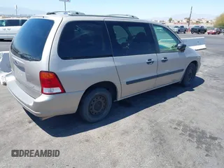 2003 Ford Windstar LX with VIN 2FMZA51493BA07188, listed as a IAAI auction lot 42096389 with 119,039 mi miles and . Bid and sale history available at carsss.com. Image 4.