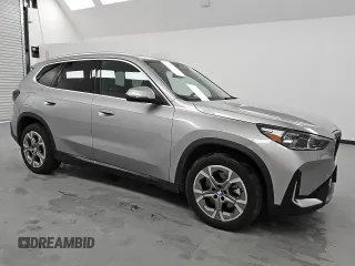 2023 BMW X1 xDrive28i with VIN WBX73EF00P5X84545, listed as a Copart auction lot 49742915 with 26,905 mi miles and Clean Title. Bid and sale history available at DreamBid. Image 4.