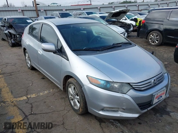 2010 Honda Insight EX with VIN JHMZE2H77AS022538, listed as a IAAI auction lot 41804579 with 184,000 mi miles and . Bid and sale history available at DreamBid. Image 1.