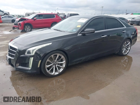 2014 Cadillac CTS Vsport Premium RWD z VIN 1G6AV5S89E0148907, wystawiony jako IAAI lot #41880678 z przebiegiem 148 052 mil mil oraz . Historia ofert i sprzedaży dostępna na DreamBid. Obrazek 2.