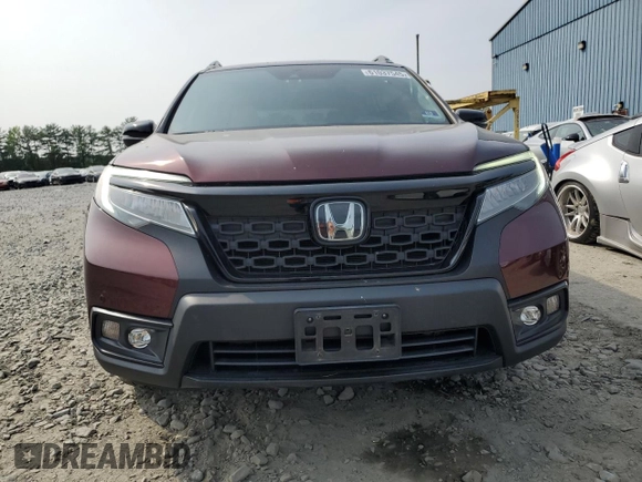 2019 Honda Passport Touring with VIN 5FNYF8H9XKB026631, listed as a Copart auction lot 61037545 with 54,041 mi miles and Salvage title. Bid and sale history available at DreamBid. Image 5.