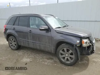 2012 Suzuki Grand Vitara Limited z VIN JS3TD0D74C4100965, wystawiony jako Copart lot #52727894 z przebiegiem 150 760 mil mil oraz Szkoda całkowita • Salvage title. Historia ofert i sprzedaży dostępna na DreamBid. Obrazek 4.